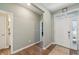 Inviting foyer with hardwood floors and access to home office at 1972 Mobley Dr, Westfield, IN 46074