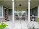 Inviting covered front porch with rocking chairs and a grill for enjoying the outdoors at 1972 Mobley Dr, Westfield, IN 46074