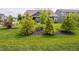 Inviting front yard featuring meticulously manicured landscaping and vibrant green lawn at 1972 Mobley Dr, Westfield, IN 46074