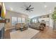 Open-concept living room and kitchen area with modern furnishings and ample natural light at 1972 Mobley Dr, Westfield, IN 46074
