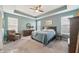 Relaxing primary bedroom with tray ceilings, carpet floors, and plentiful natural light at 1972 Mobley Dr, Westfield, IN 46074