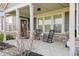 Inviting front porch featuring rocking chairs and a pleasant view, perfect for relaxing outdoors at 1972 Mobley Dr, Westfield, IN 46074