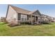 Charming single-story home with a well-manicured lawn and stylish gray siding at 1972 Mobley Dr, Westfield, IN 46074