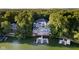 Sprawling lakefront estate with a pool, expansive decking, and a private boat dock at 219 Surrey Hill, Noblesville, IN 46062