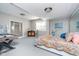 Bright bedroom features a walk-in shower, comfortable bed, and ample natural light at 219 Surrey Hill, Noblesville, IN 46062