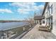 Expansive deck overlooking the water, offering outdoor lounging and stunning views at 219 Surrey Hill, Noblesville, IN 46062