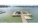 Wide shot of a covered boat dock with lifts on a waterfront property on a beautiful lake at 219 Surrey Hill, Noblesville, IN 46062