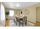 An elegant dining room with stylish furnishings, natural light, and tasteful decor at 2210 Douglas Rd, Indianapolis, IN 46220