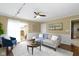 Bright living room with hardwood floors, and access to the backyard at 2210 Douglas Rd, Indianapolis, IN 46220