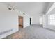 Large bedroom with neutral carpet and ample closet space at 230 E 9Th St # 502, Indianapolis, IN 46204