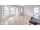 Bright living area boasting hardwood floors, oversized windows, and a stylish island at 230 E 9Th St # 502, Indianapolis, IN 46204