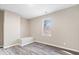 This bedroom has wood-look flooring, neutral walls, a window, and additional built-in feature at 241 N Tacoma Ave, Indianapolis, IN 46201