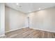 Bright living room with modern floors, neutral paint, and recessed lighting at 241 N Tacoma Ave, Indianapolis, IN 46201