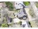 Aerial view of the property showcasing the house, backyard, patio, and surrounding neighborhood at 25 W 59Th St, Indianapolis, IN 46208
