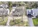 A bird's-eye view showcases the property's mature trees, surrounding neighborhood, and charming curb appeal at 25 W 59Th St, Indianapolis, IN 46208