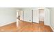 Expansive bedroom with wood floors, a closet and a open doorway at 25 W 59Th St, Indianapolis, IN 46208