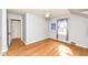 Light-filled bedroom with wood floors, two windows and a closet at 25 W 59Th St, Indianapolis, IN 46208
