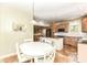 Open concept kitchen featuring an island with countertop seating and natural light at 25 W 59Th St, Indianapolis, IN 46208