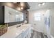 Charming bathroom with white vanity, new lighting, and tub and shower combo at 2511 Ritter Dr, Anderson, IN 46012