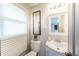 Well-lit bathroom with modern vanity and window at 2511 Ritter Dr, Anderson, IN 46012