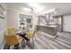 Cozy dining room with seating for four, opening up to the kitchen and living room at 2511 Ritter Dr, Anderson, IN 46012