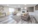 Living room offering ample seating, fireplace, modern paint and hardwood flooring at 2511 Ritter Dr, Anderson, IN 46012