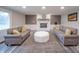 Cozy living room includes a brick fireplace, and comfortable seating at 2511 Ritter Dr, Anderson, IN 46012
