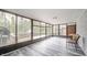 Sun room with brick walls and modern floor at 2511 Ritter Dr, Anderson, IN 46012