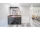 Bar area features storage space and easy access to the dining room at 2511 Ritter Dr, Anderson, IN 46012