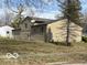 The side of the home shows the two-story structure at 2526 Sheffield Dr, Indianapolis, IN 46229