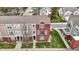 Beautiful townhome featuring a classic brick design and balcony at 253 1St Nw St, Carmel, IN 46032