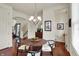Charming dining area featuring a stylish chandelier and modern decor in a well-lit space at 253 1St Nw St, Carmel, IN 46032