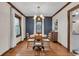 Inviting dining room with a round wooden table, hardwood floors, and classic trim at 2737 Napoleon St, Indianapolis, IN 46203
