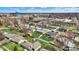 Picturesque aerial view of a residential area with a mix of homes, community amenities, and green spaces at 318 Winfield St, Greenfield, IN 46140