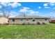 Expansive backyard with green grass, ideal for outdoor activities, gardening, or entertaining guests at 318 Winfield St, Greenfield, IN 46140