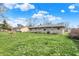 Spacious backyard with lush green grass and plenty of room for outdoor activities and enjoyment at 318 Winfield St, Greenfield, IN 46140