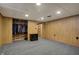 Carpeted basement with closet wardrobe and potential for additional storage or customization at 318 Winfield St, Greenfield, IN 46140