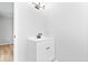Modern bathroom with a vanity, updated lighting, and white cabinets at 322 S Boehning St, Indianapolis, IN 46219