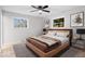 Comfortable bedroom featuring a large bed, soft lighting, and stylish decor for a relaxing retreat at 322 S Boehning St, Indianapolis, IN 46219