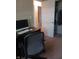 Bedroom featuring a desk with computer, chair and closet at 351 N Smart St, Greenwood, IN 46142