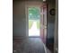 View from inside the home looking out to the landscaped front yard at 351 N Smart St, Greenwood, IN 46142
