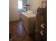 Practical laundry room with washer, dryer, and hot water heater at 351 N Smart St, Greenwood, IN 46142