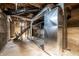 Unfinished basement space, including stairs, ducts and ventilation at 359 N Whitcomb Ave, Indianapolis, IN 46224
