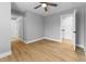 Spacious bedroom offers natural light, wood flooring and ample closet space, providing comfort and convenience at 401 Iowa St, Indianapolis, IN 46225