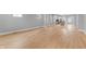 Spacious open plan featuring hardwood floors, recessed lighting, and lots of room for living at 401 Iowa St, Indianapolis, IN 46225