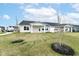 This backyard features well-maintained lawn space, offering a serene outdoor space for relaxation at 4179 Hume Ave, Plainfield, IN 46168