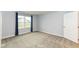 Cozy bedroom with carpet, a window with blinds, and a closet at 4179 Hume Ave, Plainfield, IN 46168