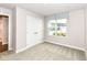 Bedroom with a window, double closets, and carpet at 4179 Hume Ave, Plainfield, IN 46168