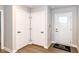 Welcoming foyer with a stylish welcome mat, providing an inviting and practical entrance to the home at 4179 Hume Ave, Plainfield, IN 46168