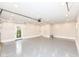 This is a large two car garage with an epoxy floor and a side entry door at 4179 Hume Ave, Plainfield, IN 46168